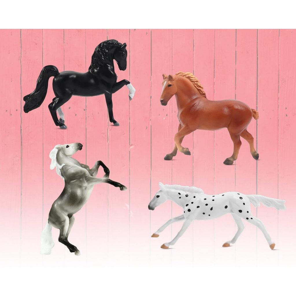 Image of some of the possible included horse figurines. One is black, one is red-brown, one is grey, and one is white with black spots.