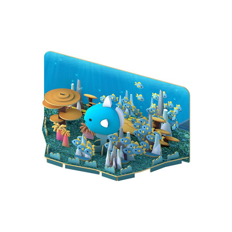 Image of the included Ocean Fish diorama. There is a spot in the center that the figurine would fit perfectly in to complete the scene.