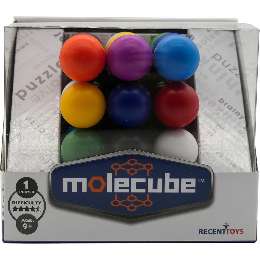 Image of the packaging for the Molecube 3D Puzzle. Part of the front is made from clear plastic so you can see the puzzle inside.