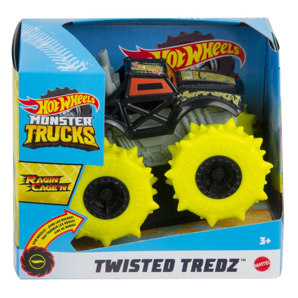 Image of one of the Monster Truck Rev Tredz Hot Wheels vehicles. This one has a black body and large spiky yellow tires.