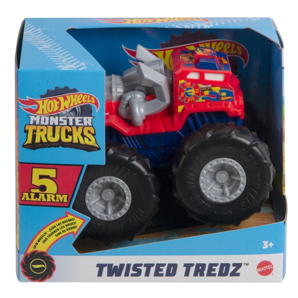Image of one of the Monster Truck Rev Tredz Hot Wheels vehicles. This one has a red body with huge exhaust pipes and large black tires.