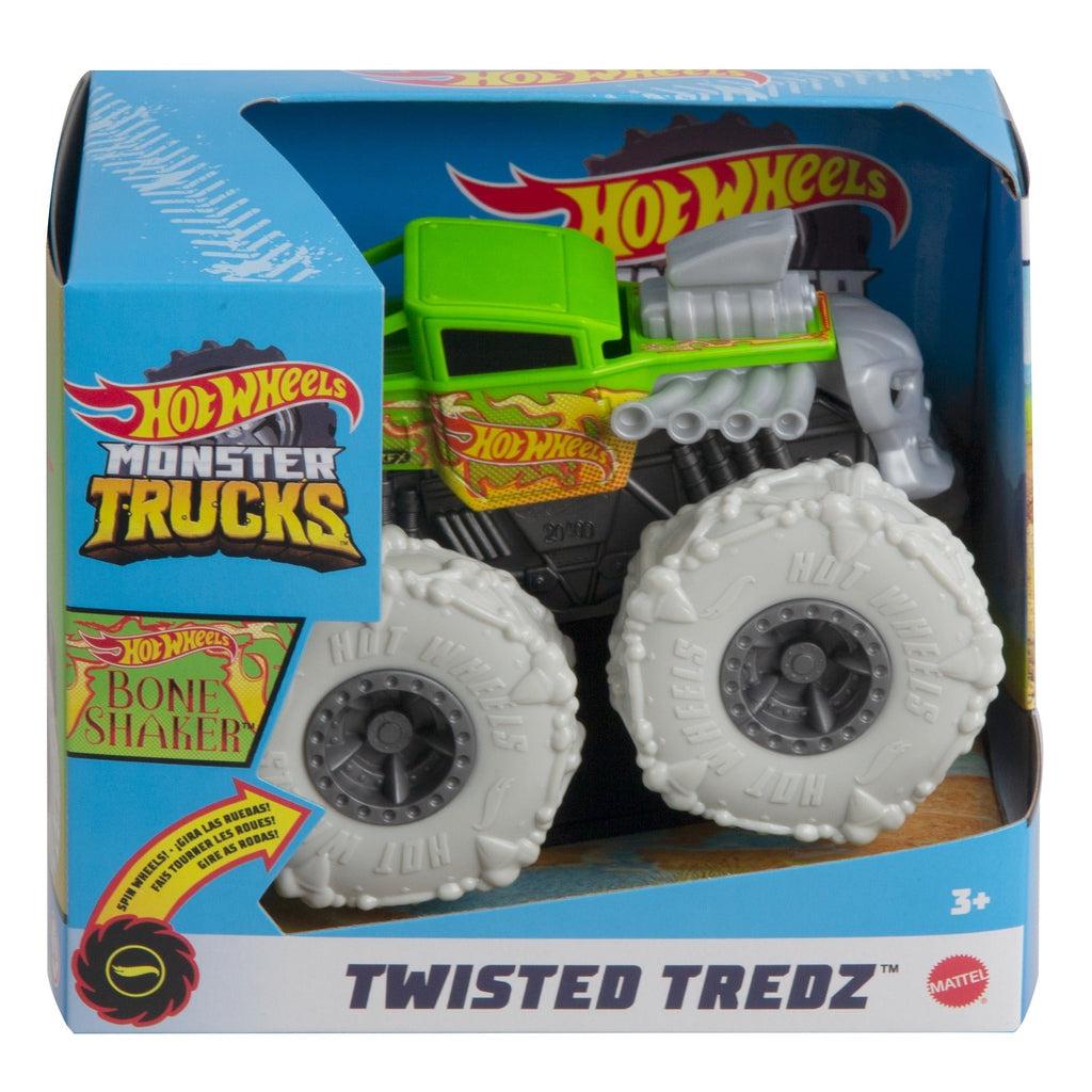 Image of one of the Monster Truck Rev Tredz Hot Wheels vehicles. This one has a green body and large white tires.