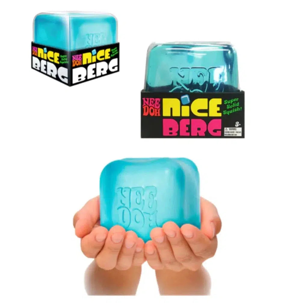 Blue Nee Doh Nice Berg stress toy in packaging and held in hands, showcasing its soft and squishy texture.