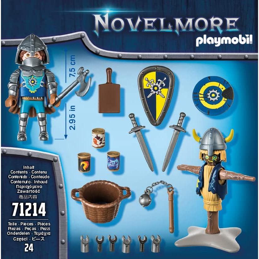 THis image shows the contents of the box, a knight, a practice dummy, two swrods, two schields, a paddle, three colored wood blocks, an axe, a flail, and come attachable hands