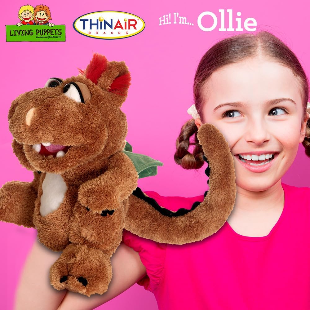 this image shows a girl holding the ollie pupped and maneuvering her mouth to talk.