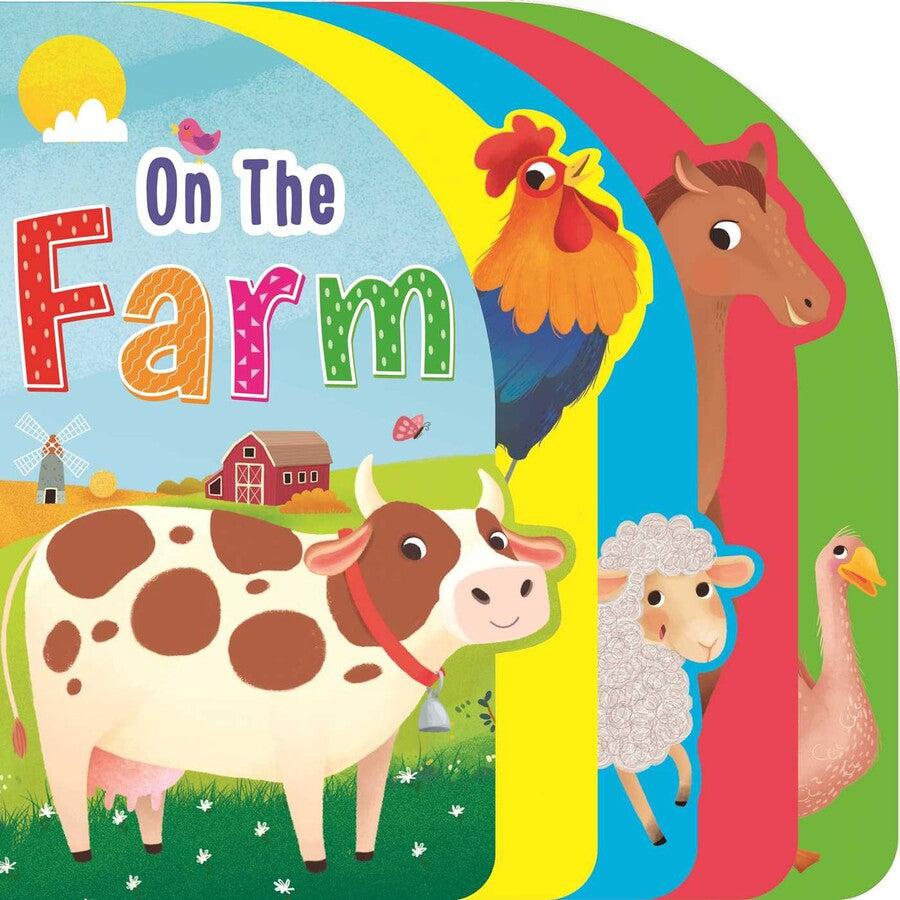 Image of the front cover of On The Farm book. On the front is a picture of a cow on a farm.