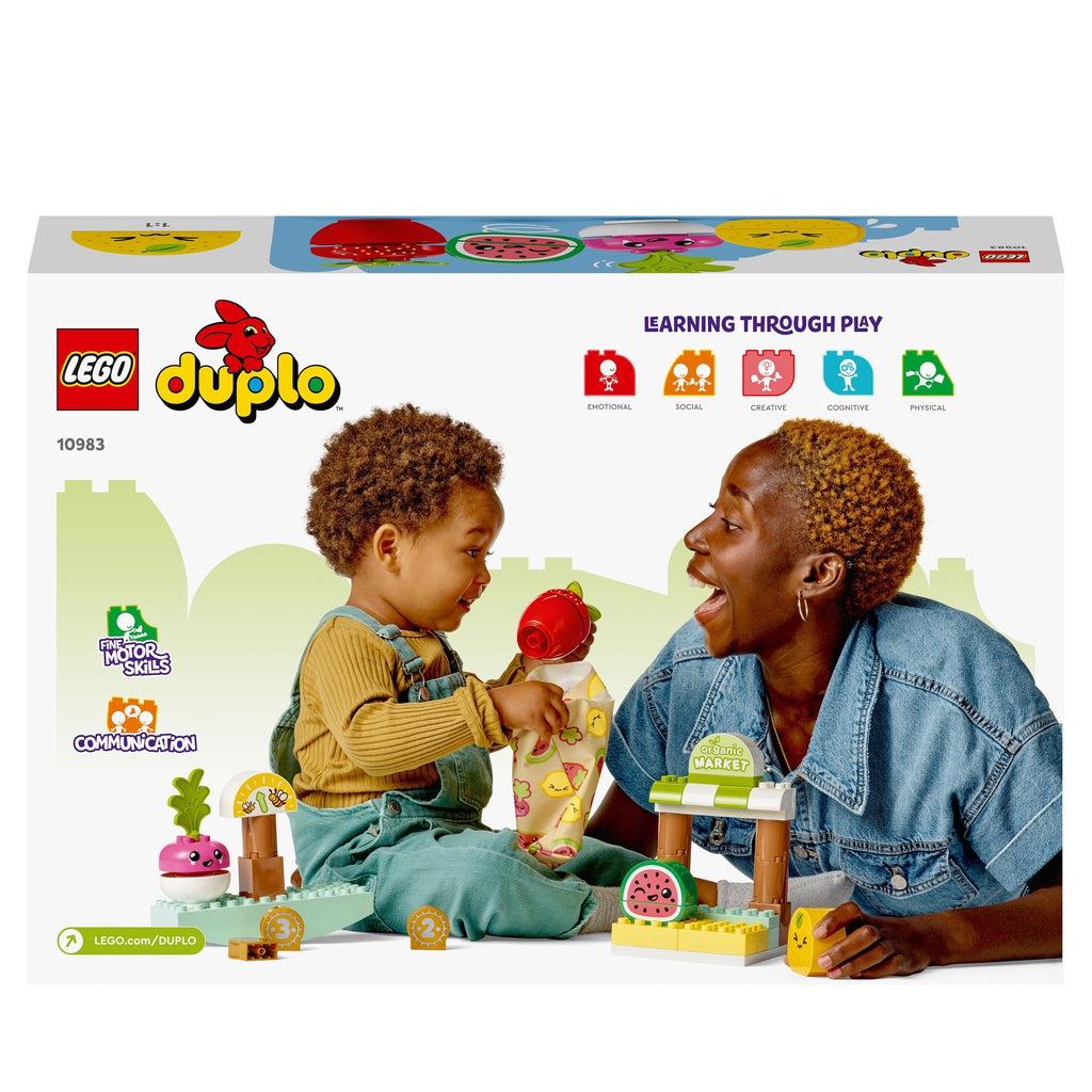Image of the back of the box. It has a picture of a mother and her son playing with the playset.