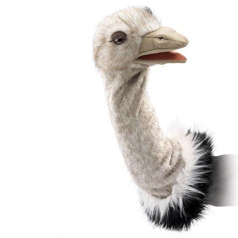 Front of puppet | Black and white fluffy base connects to long tan neck and head. | Ostrich head has realistic droopy eyes with long black eyelashes. | Beak is made of an fabric and has a light pink interior.