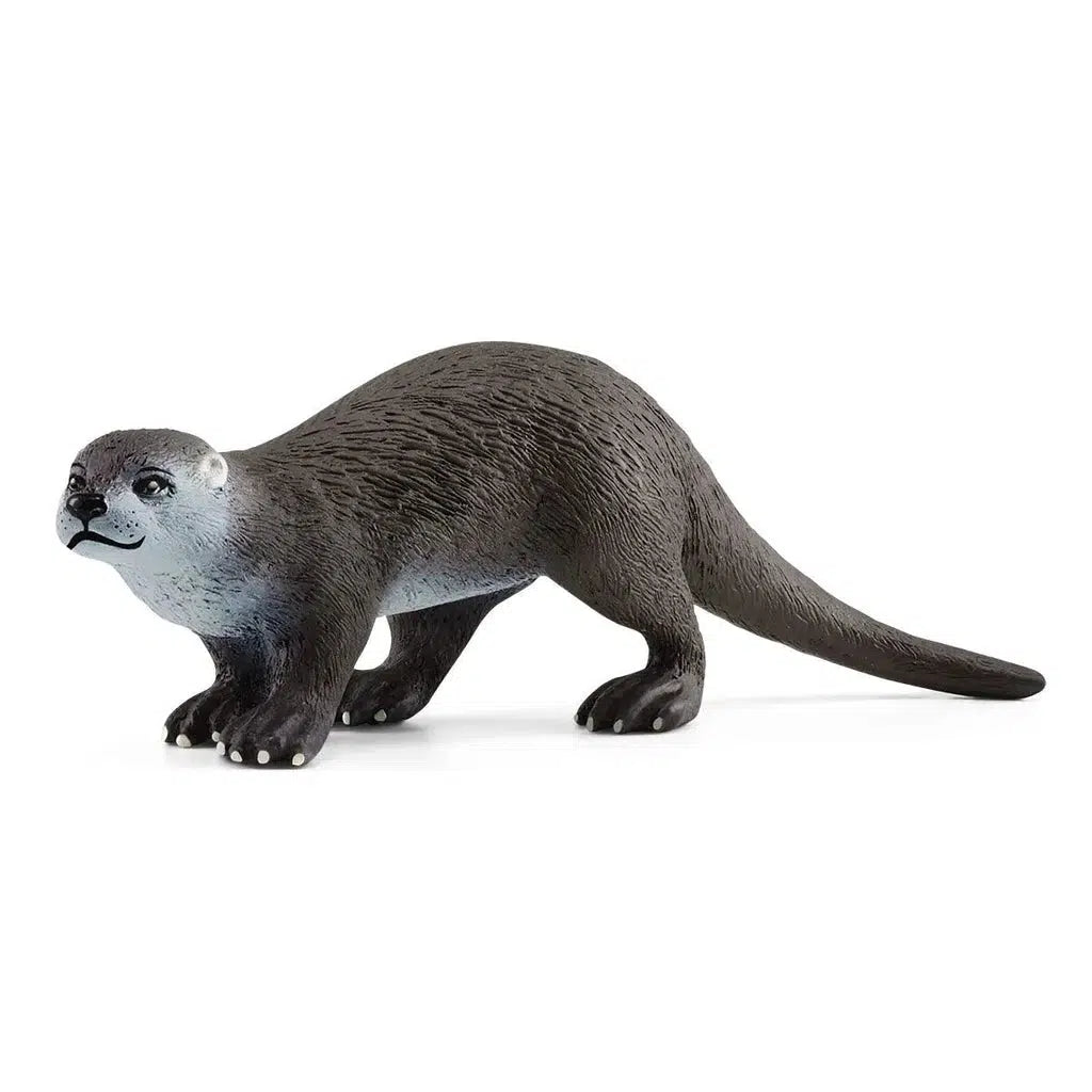 Image of the Otter figurine. It is a dark grey animal with a lighter belly, neck, and face. It has a long tail.