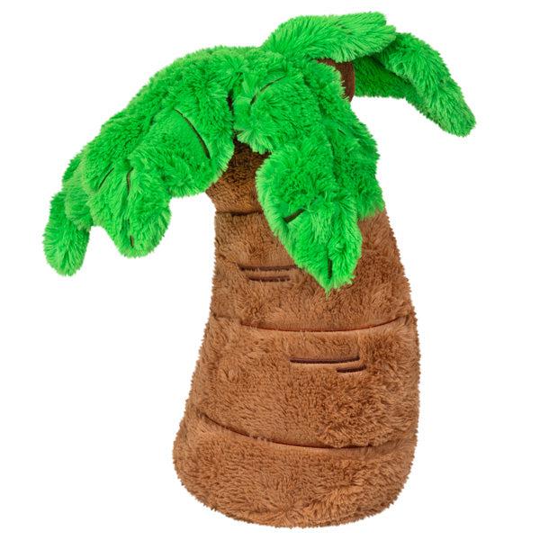 Back view of the plush. The green leaves are shaped like palm leaves.