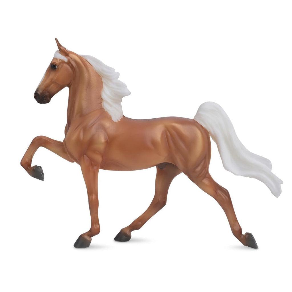 Image of the Palomino Saddlebred figurine. It is a sienna colored horse with a stark white mane and tail.