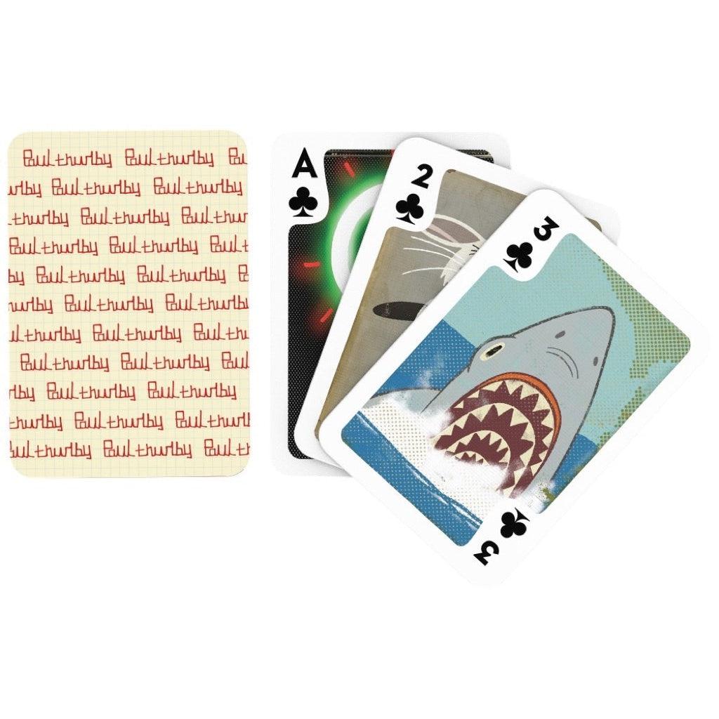 Image of the back of the deck of cards. On it is Paul Thurlby's signature in red ink repeated to fill the entire card.