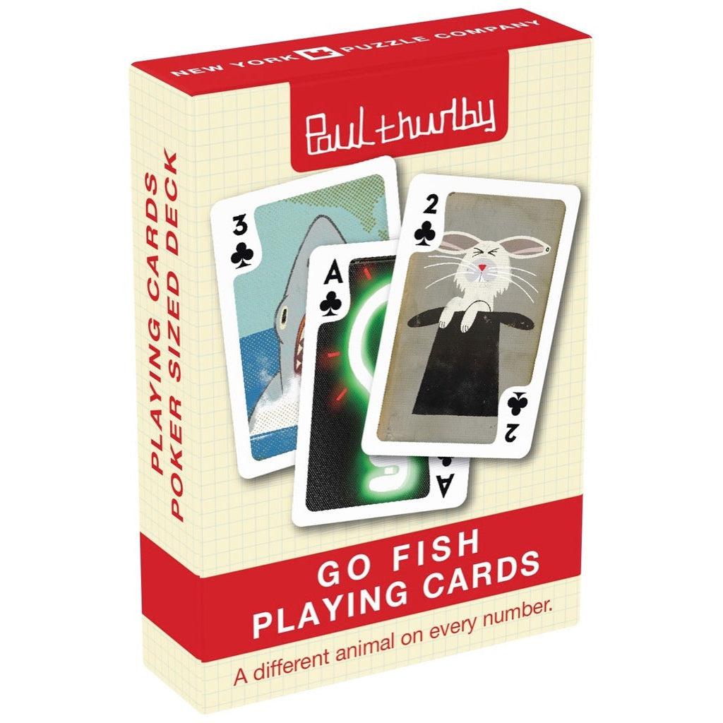 Image of the box for the Paul Thurlby Go FIsh card deck. On the front is a picture of three cards with drawings by Paul Thurlby on their face.