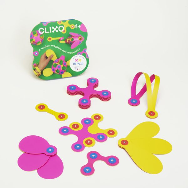 Colorful Clixo shapes scattered next to their mini pack.