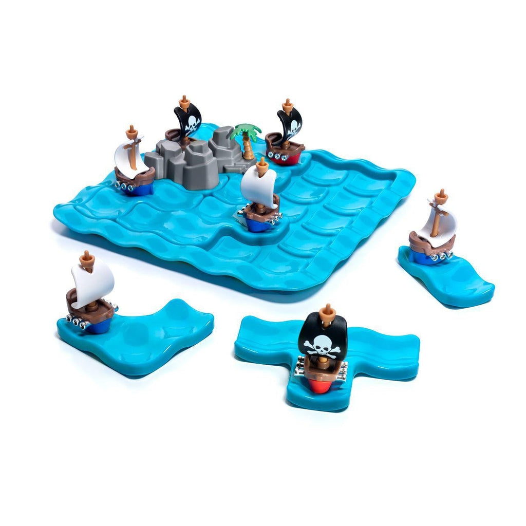 Image of the game board and its included pieces. It comes with an ocean wave shaped game board and pirate ship pieces in different grid shapes that are made to fill up the board.