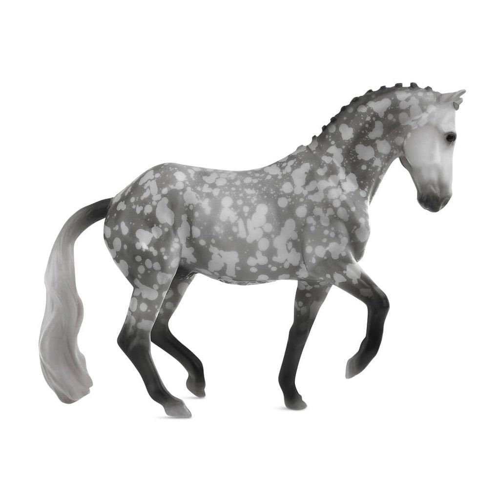 Image of one of the horses. it is a grey and dark grey speckled horse with black legs and nose.