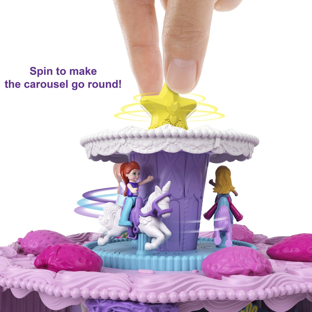 Shows that the star on top of the cake can spin around the carousel.