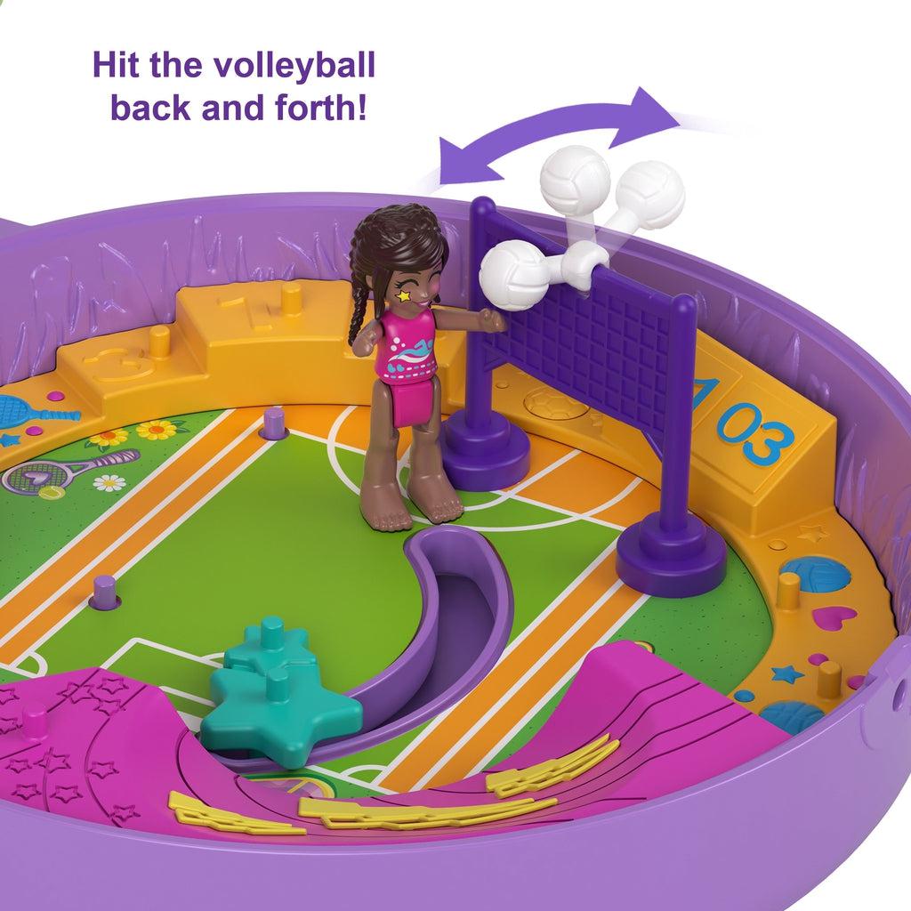 Shows that the volley ball hoop has a ball attached that can be hit back and forth from side to side.