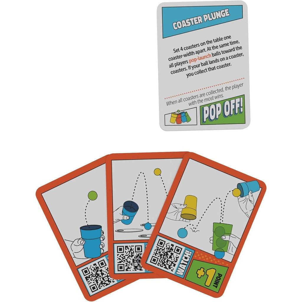 this image shows there are cards in the game to show how the trick shot needs to be made to pop off. complete the challenge written down to get a point