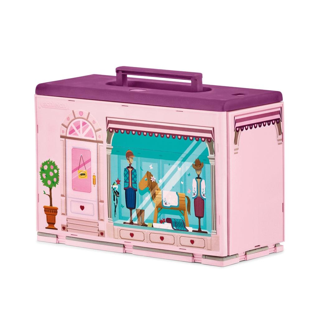Shows that all the included boutique play set pieces can be stored into the included carrying case.