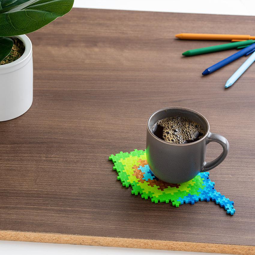 Shows that you could use the peacock feather puzzle as a coaster.