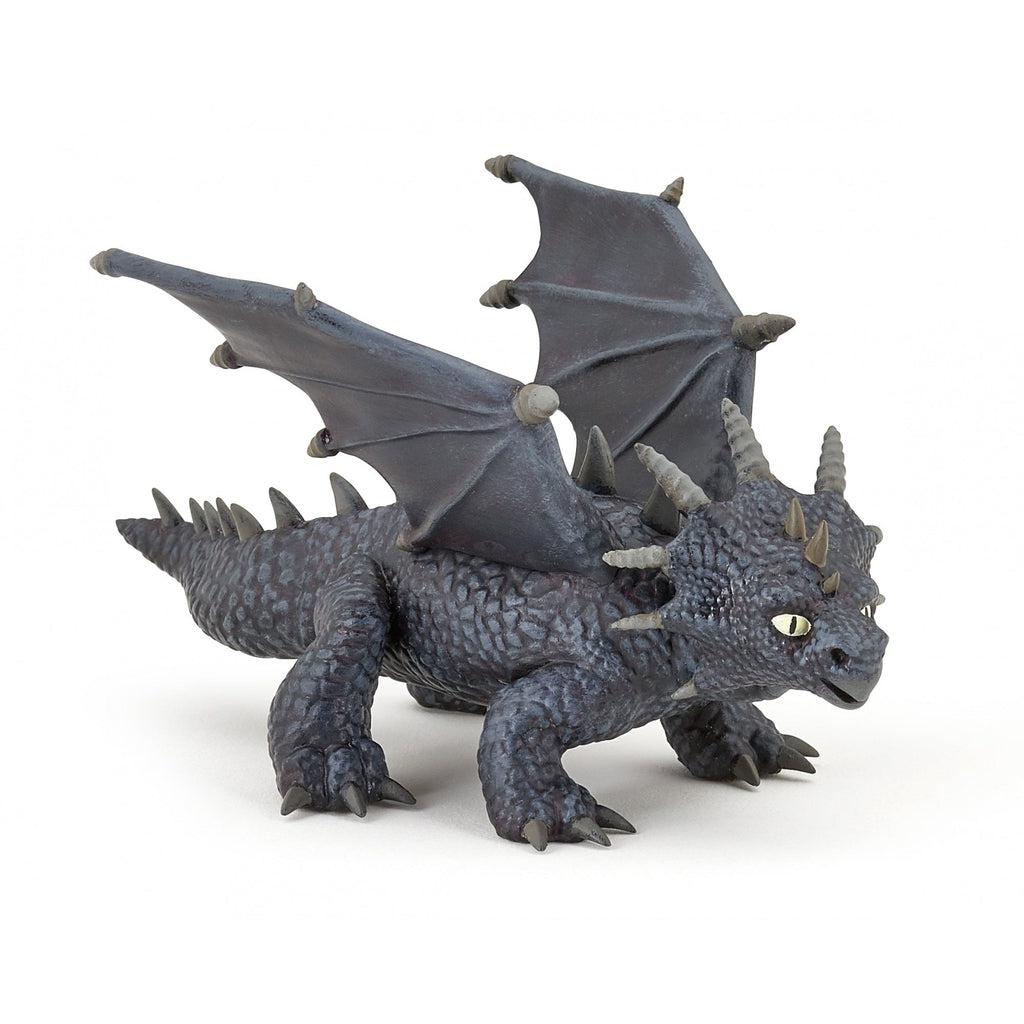 Image of the Pyro figurine. It is a dark grey dragon with scales, wings, and horns.