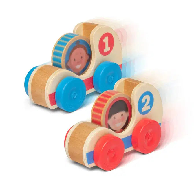 Image of the toy outside of the packaging. It includes two race cars (one red and one blue with alternating colored wheels) and two racer character disks.