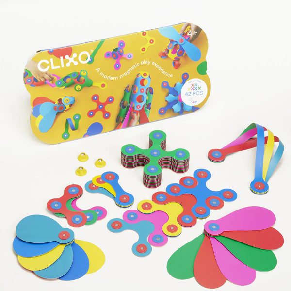 Colorful Clixo children's magnetic building toy set with various shapes and pieces displayed next to its packaging to keep kids engaged as they build creations.