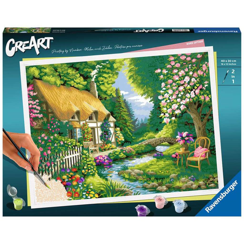 A vibrant cottage to CreArt with. this paint by numbers is extremely detailed with lots of flowers in the tree a cozy cottage with smoke billowing out the chimnet, and a lush river gliding down. relax while painting by numbers. 