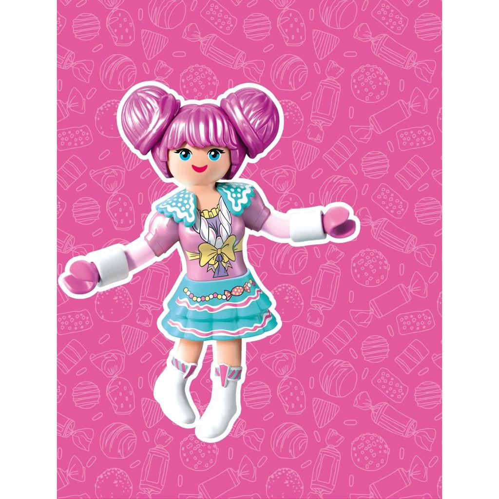 This picture shows the doll rosalee alone with a pink candy background