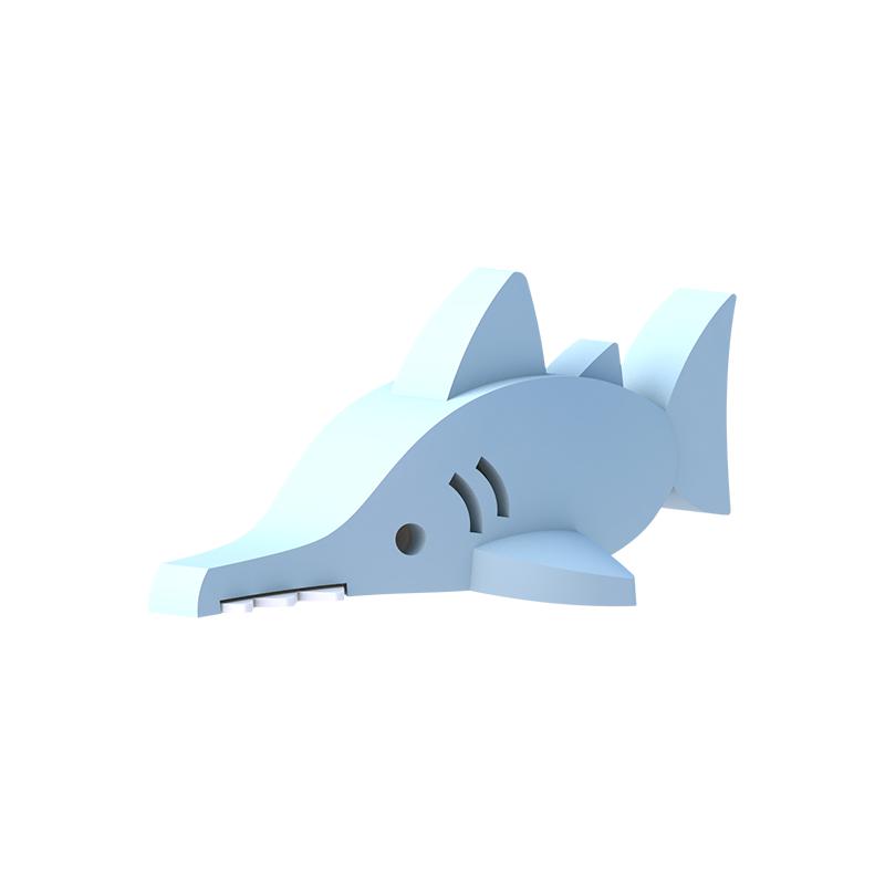 Image of the Saw Shark figurine. It is a geometric light blue saw shark. It has details to show gills and its teeth are white.