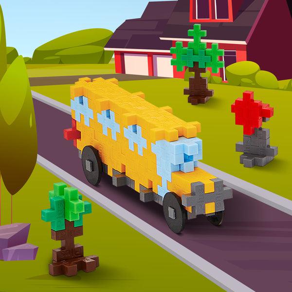 a yellow school bus with a stop sign and trees made from Plus plus