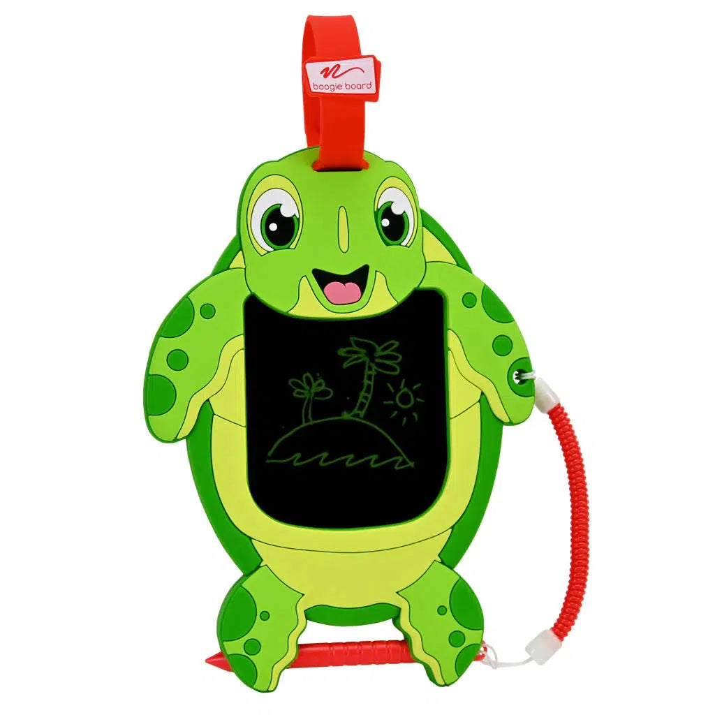 image of the sea turtle boogie board. there is a pen on her arm and a clip on her head to trabel.