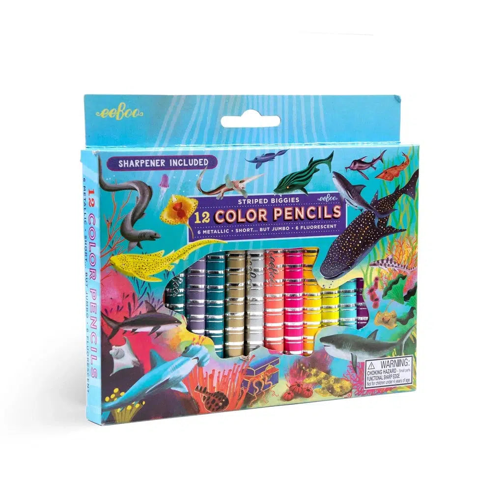 this image shows 12 color pencils that have a shark theme art on the box. there is a pencil sharpner inside