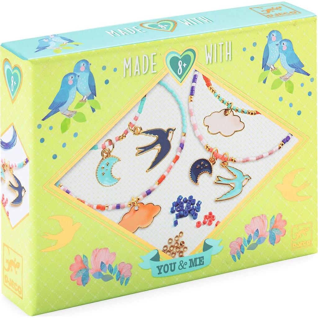 Image of the packaging for the Sky Multi-Wrap Beads & Jewelry craft kit. On the front is a picture of what the finished product could look like.