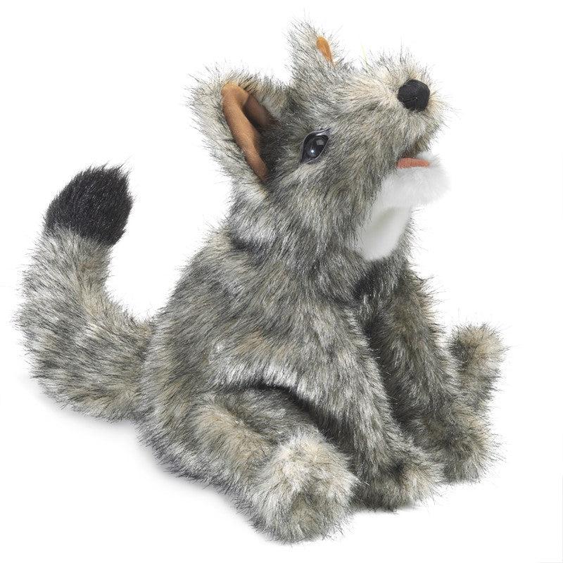 Front of puppet | Body has soft gray fur and a black tipped tail. | Face has a white bottom jaw and realistic black nose and eyes. | The inside of the ears and mouth are covered in soft pinkish brown fabric.