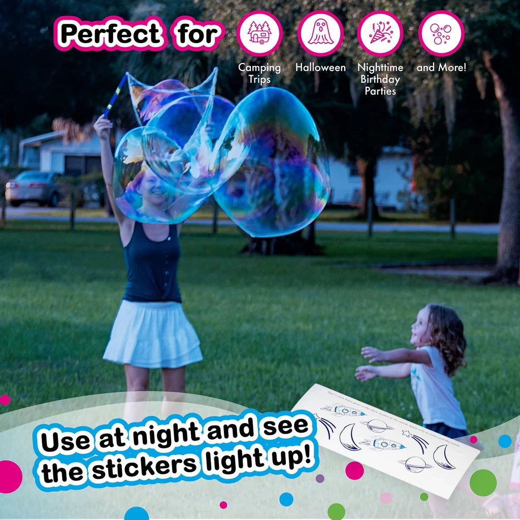 Children playing with gigantic, glowing bubbles outdoors at dusk, with icons indicating suitability for camping, Halloween, nighttime, and birthday parties.