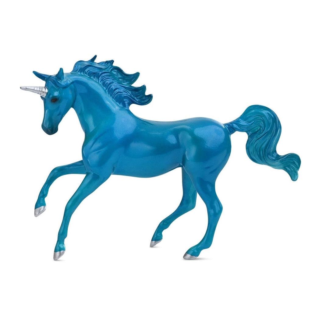 Image of the light blue unicorn. It is very shiny and completely light blue except for its silver horn and hooves.