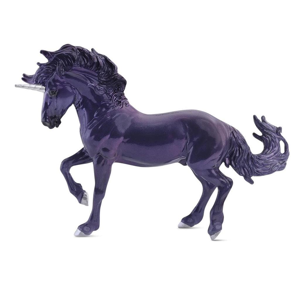 Image of the purple unicorn. It a completely shiny and purple unicorn except for its silver horn and hooves.