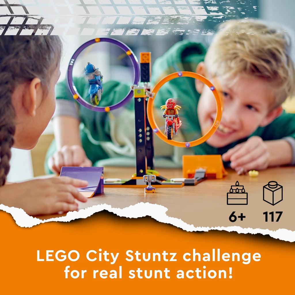 Scene of two kids playing with the LEGO playset. Recommended Age: 6+ Number of Pieces: 117 Caption: LEGO City Stuntz challenge for real stunt action!