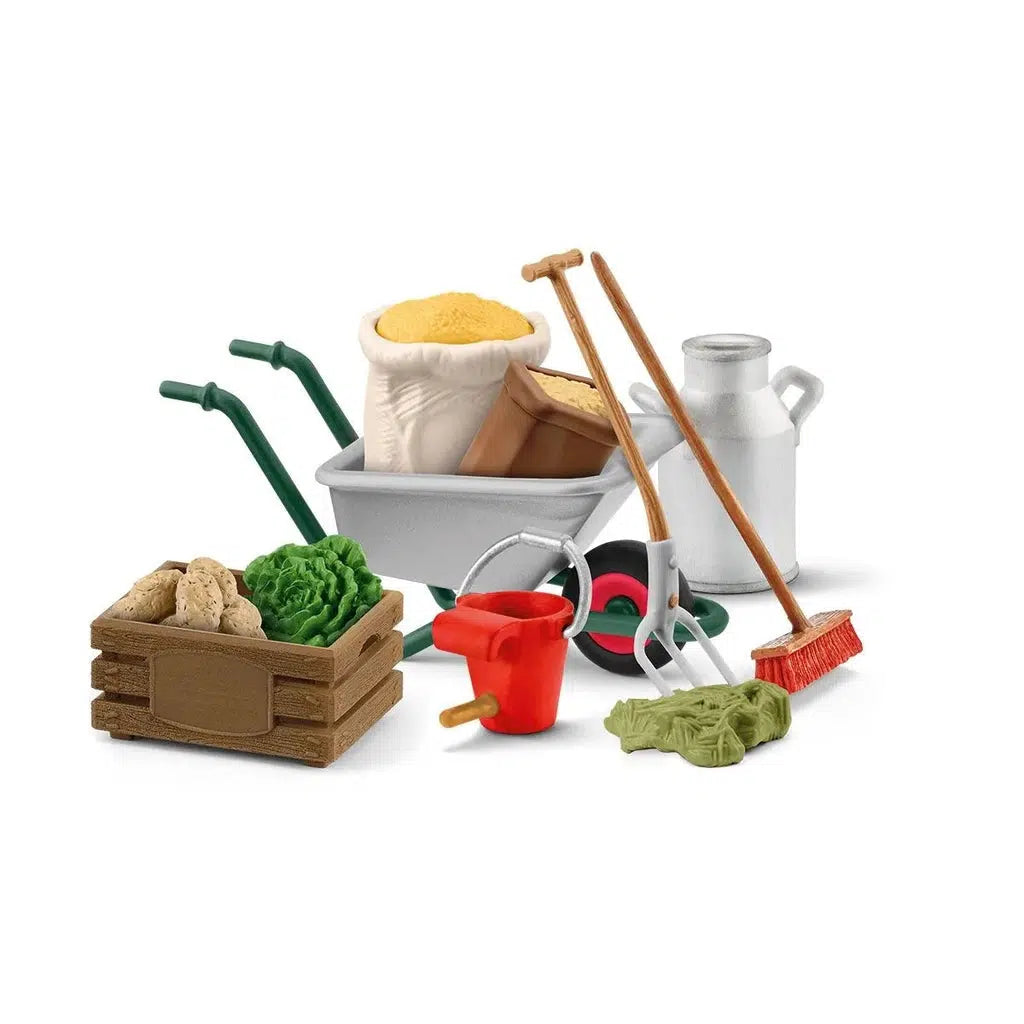 Image of the Stable Care Accessories figurine set. It comes with a wheelbarrow, some tools, various foods, and a crate.