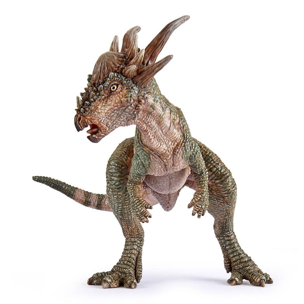 Image of the Stygimoloch figurine. It is a tall green and tan dinosaur with large horns on its head. It stands on two legs and it has a long tail.
