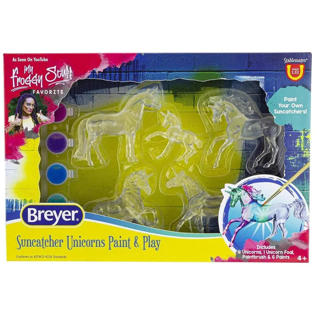 Image of the Suncatcher Unicorn Paint and Play craft set. Part of the front is cut out so you can see the craft inside.
