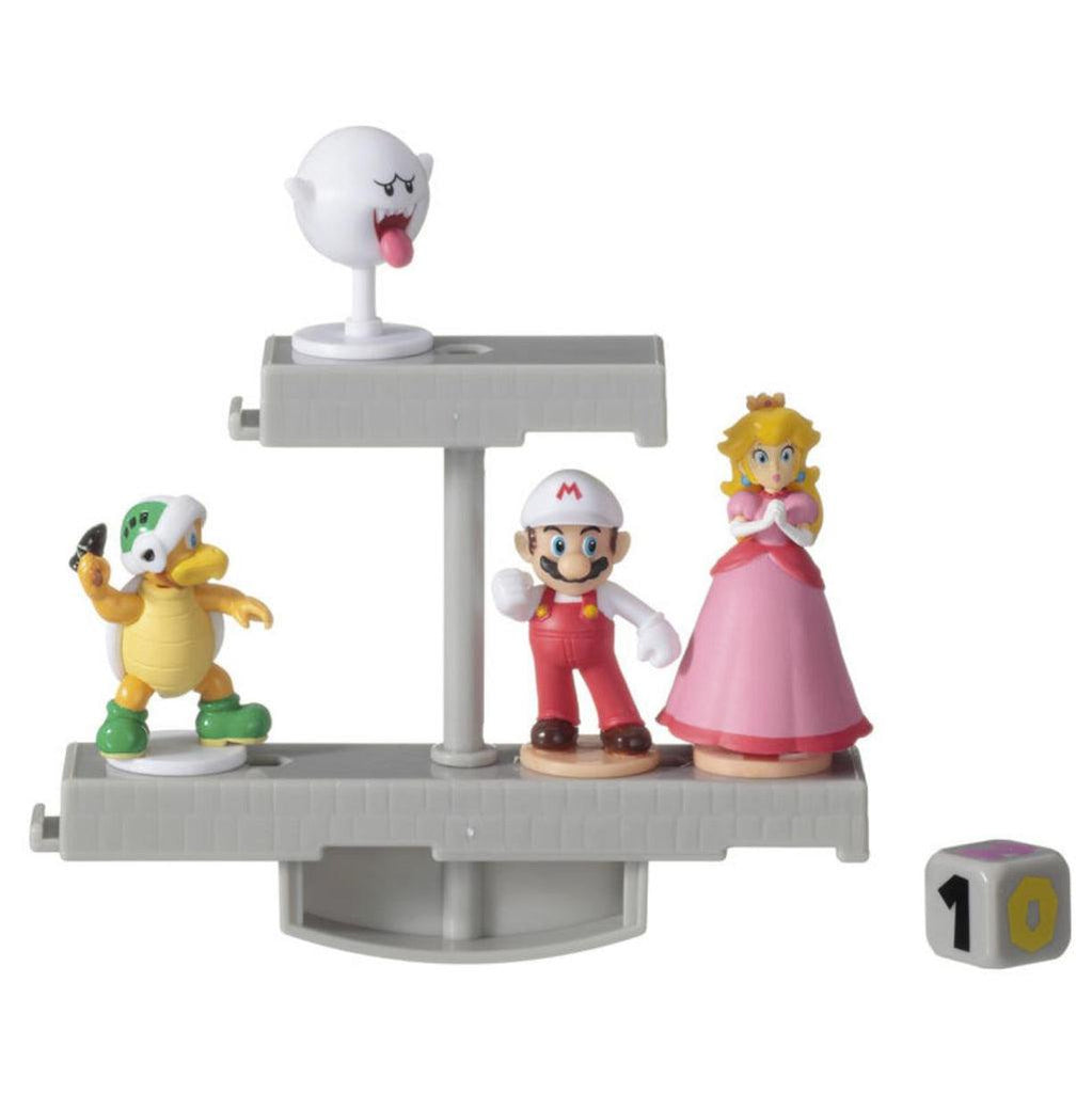 Image of the castle game. It is made from grey plastic and it comes with fire power Mario, Peach, a boo, and a hammer bro.