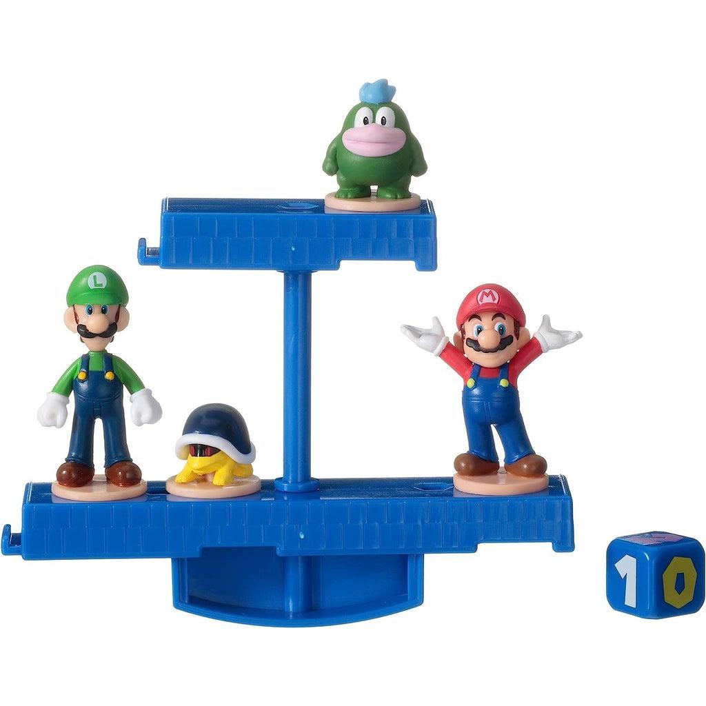 Image of the toy outside of the packaging. It is made from blue plastic and comes with a Mario, a Luigi, a buzzy beetle, and a spike figure.