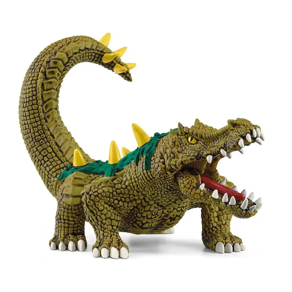 Image of the Swamp Monster figurine. It is a brown/green alligator with dark green sludge and yellow spikes on its back and tail.