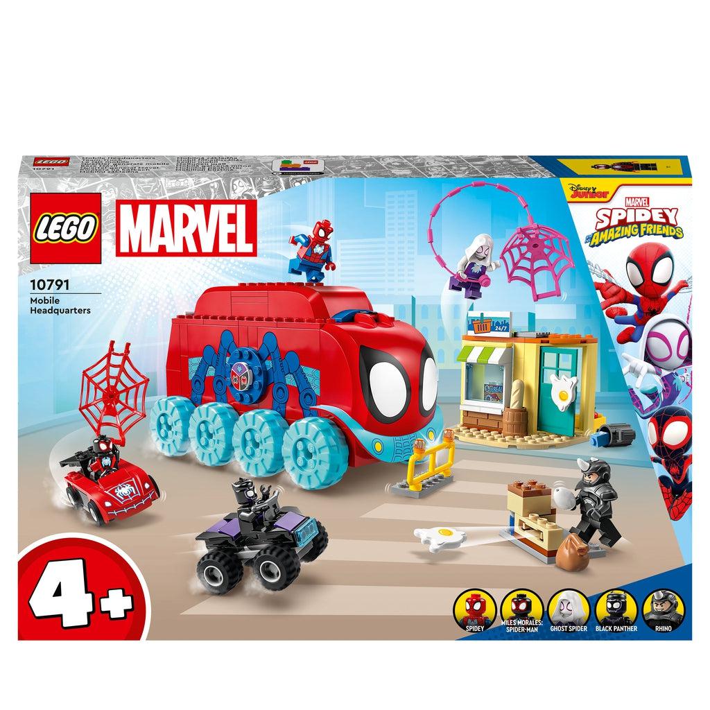 box showing the lego set which is a spiderman themed armored truck, a storefront, 5 minifigures, and other accessories
