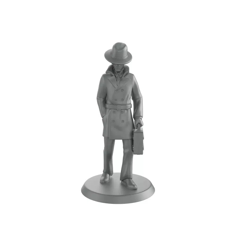 Close up of the detective figure. It is dark grey and it has lots of detail on his clothing. He is wearing a trench coat, a fedora, slacks, dress shoes, and is holding a briefcase. He has one hand in his pocket and he is slouched slightly.
