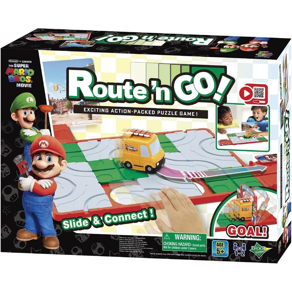 Image of the packaging for The Super Mario Movie Route 'N Go puzzle game. On the front is a picture of the puzzle game mid-solve as well as the Mario and the Luigi renders from the movie.