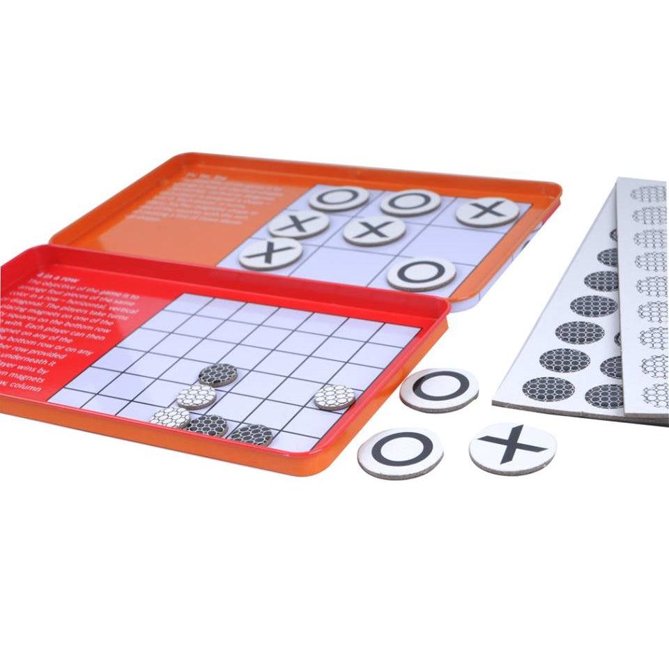 Image of the open magnetic box. There is one game of each side of the lids with their respective instructions next to the game boards. It comes with larger tic tac toe circles and smaller black and white discs.